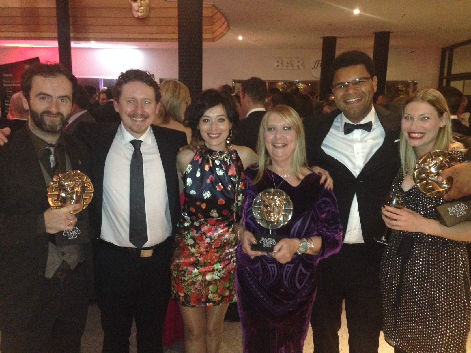 The Machine team at BAFTA Cymru Awards with trophies